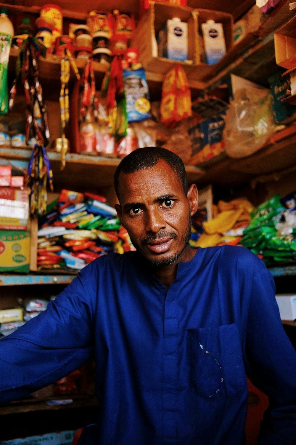 A shopkeeper in a small shop