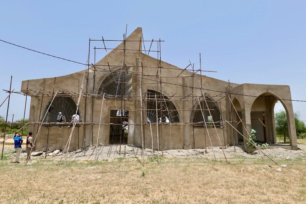 A building wrapped in scaffolding