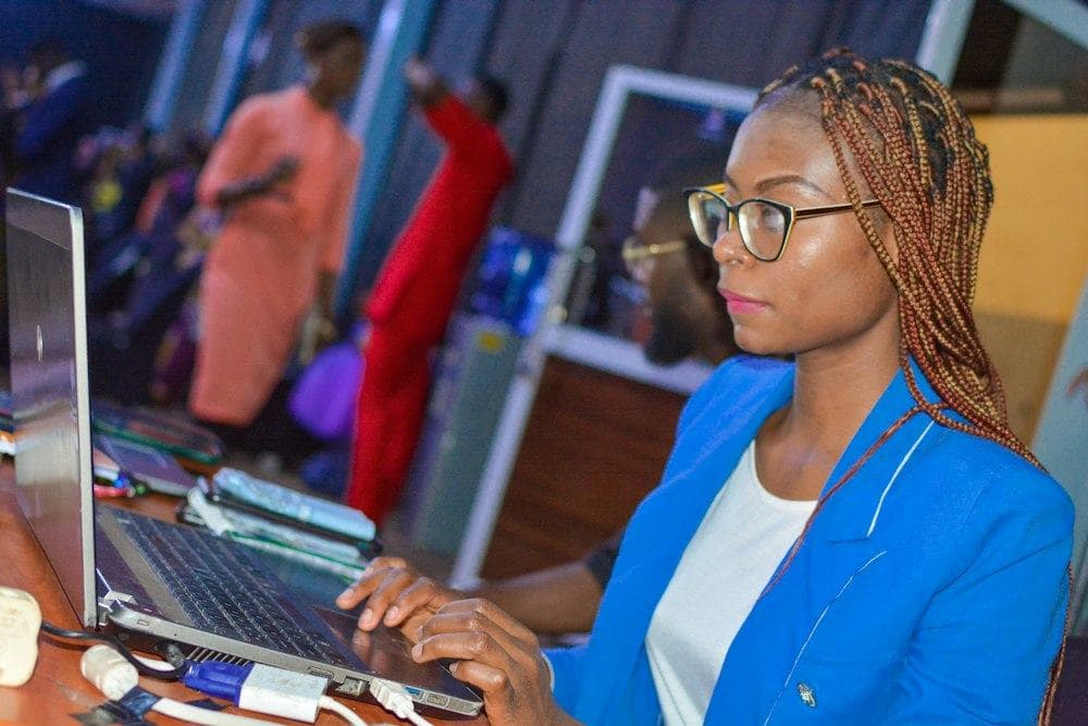 A woman working on a laptop